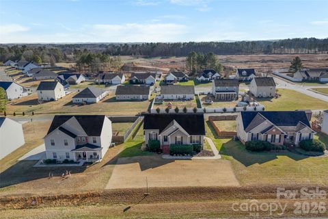 Photo of 417 Oakleigh Lane, Oakboro, NC 28129 (MLS # 4332969)