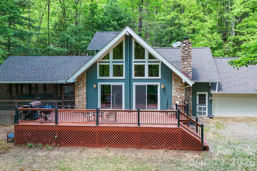 If you've been looking for your slice of heaven here in Western North Carolina, consider 491 Mckenzie Way South in Old Fort. Gateway Mountain provides its residents with 2700 acres of nature including trails, waterfalls and Lake George for boating, fishing and swimming. Boasting an expansive deck with a gas grill hook up, a screened porch with a hot tub and tv, and a vaulted great room with a fireplace and bar seating at the kitchen, this home lends itself to entertaining and relaxing. Want to listen to the birds while you rest? The sliding doors and plentiful windows let the sights and sounds in. And with three bedrooms, two full bathrooms and a nearly 400 square foot two car garage, this home is a great permanent residence or an appealing long or short term rental. Looking to build and put your own tastes in place? An adjacent 1.6 acre second lot with a small creek and an existing well is part of the offering. 

491 Mckenzie Way South is relatively close to the main gate of Gateway Mountain which means faster access to Old Fort and I-40. If you're not familiar with Old Fort, it's cute as a button. Drive into town and you'll pass multiple breweries, a distillery, coffee shops and restaurants. Head just out of town for some of the best mountain biking around, take a hike up to Catawba Falls or spend an afternoon angling as Old Fort is a designated Mountain Heritage Trout City. Inquire now about one of the best spots in Western North Carolina.