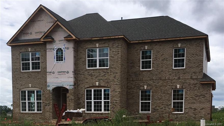 TO BE BUILT Brick-Front Providence II Home w/Guest Suite Down, 2-Car Side Load Garage w/Opener, Study w/French Doors, 9’ Ceilings, Hardwoods in Study/DR/FR/Kit/Brk/Stairs. Family Room open to Ext Breakfast Rm & Gourmet Kitchen filled w/Granite Counters, Stainless Appliances—Drop-In Electric Cooktop, Wall Oven & 42" Dark Cabinets. Upstairs boasts an Owner Suite w/Trey Ceiling & Garden Tub w/Tile Surround in MBA. 3 more bedrooms up, plus Bonus Room & laundry. Ceramic Tile in Baths. Relax on Patio