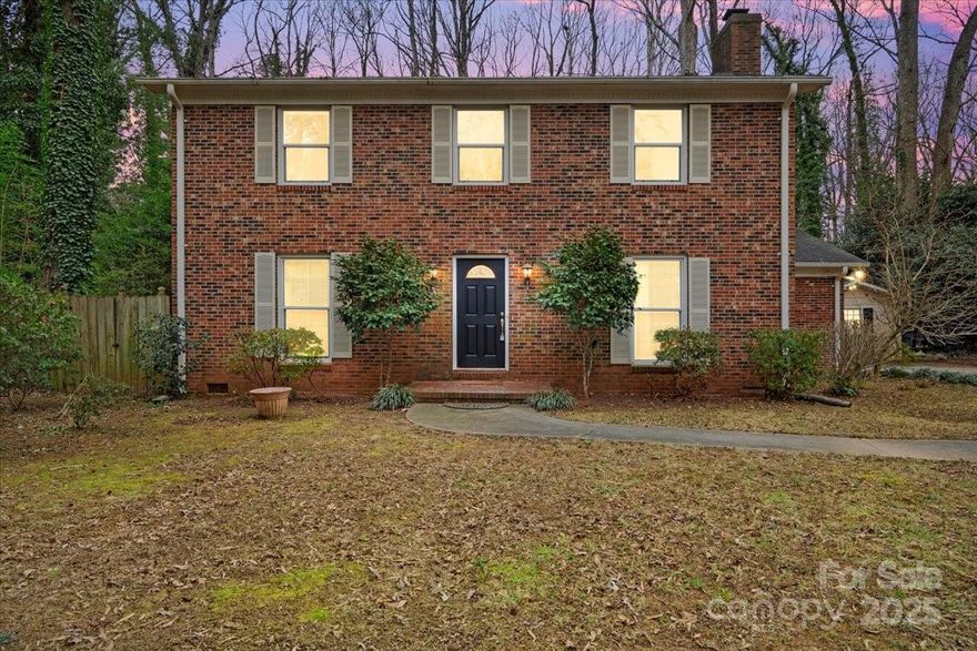 Come see this beautiful full brick home on an almost half acre lot in a quiet cul-de-sac conveniently situated with easy access to Uptown and South Charlotte. 4 spacious bedrooms and 2.5 bathrooms. Fresh paint through out. New windows. Two separate living spaces. One living room that flows into the dining room which flows into the naturally lit kitchen area. Surrounded by mature trees, the property feels like a private retreat while still being conveniently close to shopping, dining, and easy access to major highways. The outdoor space truly sets this home apart, a gazebo and a two-tier deck perfect for enjoying your morning coffee, hosting outdoor gatherings, or simply unwinding in nature. Lots of storage space in the outside workshop with electrical and plumbing connections. Schedule your tour today and experience its charm for yourself!