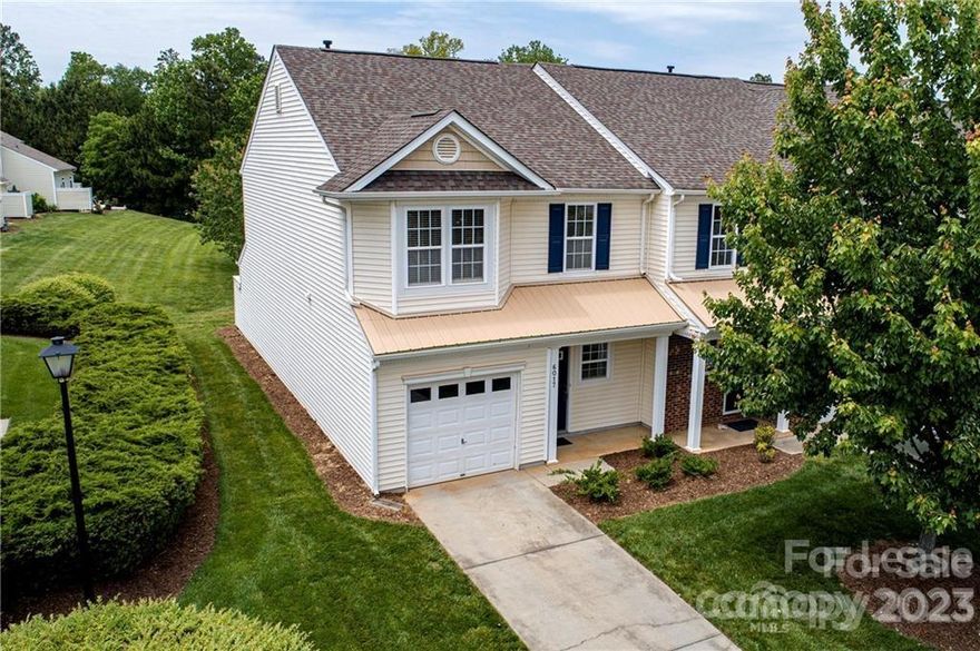 Gorgeous End Unit Town Home in the convenient area of Indian Land, close to Ballantyne and Fort Mill! 2 bedrooms and 2.5 baths with a garage.  Spacious Family Room, fireplace with gas logs, dining area, open kitchen, laminate wood flooring downstairs, new carpet on the stairs and the upstairs loft, walk in closets and two full baths upstairs, plus a convenient loft area and laundry closet. Lawn care included , and a community pool, volleyball court, basketball court and sidewalks. Private back patio, storage unit.  Convenient to many area restaurants, movie theaters and shopping. Washer and dryer included.