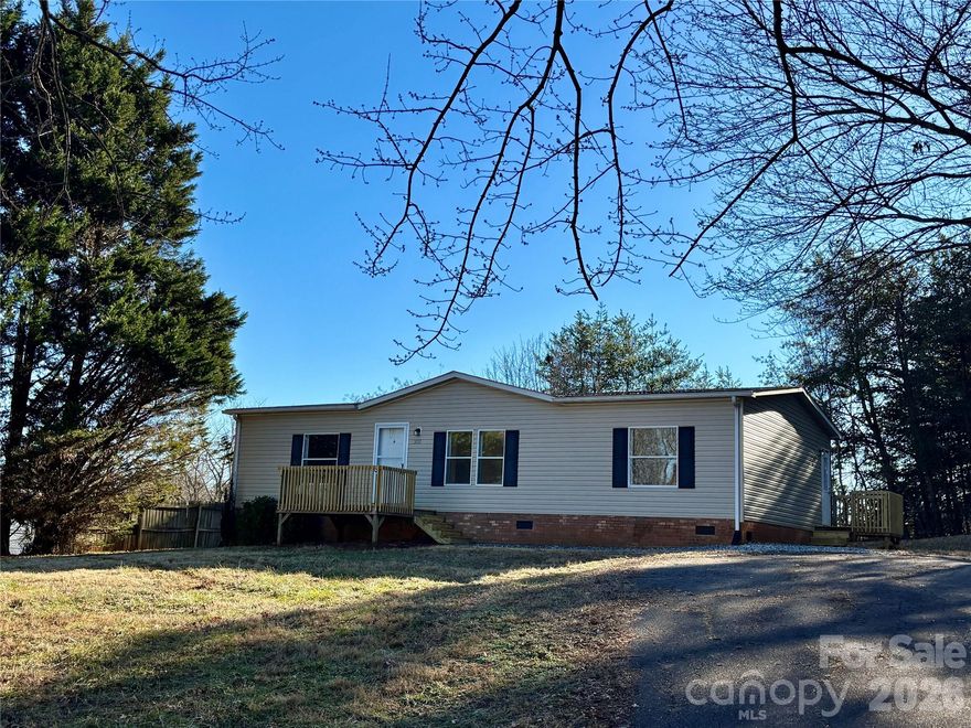 Remodeled 3BR/2BA in desirable neighborhood off Grace Chapel Road. Master bath has a new titled shower, new double sink vanity, large linen closet with mirrored barn doors. Open floor plan with new floors, new interior doors, hardware and fresh neutral paint. Updated hall bath with vanity. Spacious Primary bedroom with 2 closets. The 2nd bedroom has a walk-in closet. Front and side decks. Large lot with a buffer of trees beside the house.