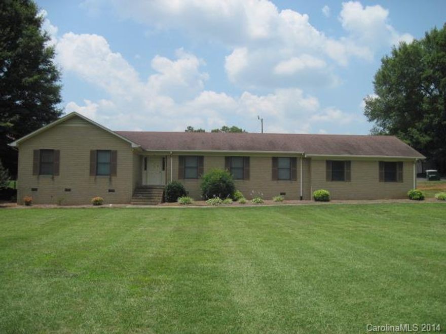 Large brick home with fireplace and large yard. Convenient to HWY 49 as well.