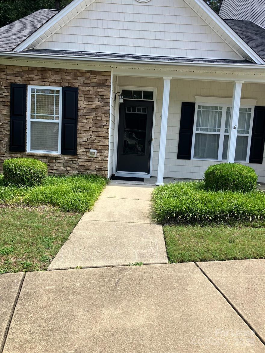 One story, end unit townhome in convenient Fuquay Varina location. Attractive complex. Open floor plan. 9 foot ceilings and hardwood floors in main living areas. Spacious living room with gas log fire place. Primary bedroom with walk in closet. Storage room off back patio. Private backyard with extended paver patio and privacy. Very clean and ready for immediate occupancy. Stacking washer and dryer to remain for tenant use but will not be repaired or replaced by landlord if any issues occur. Back patio chairs and table to remain on site if desired by tenants for their use.