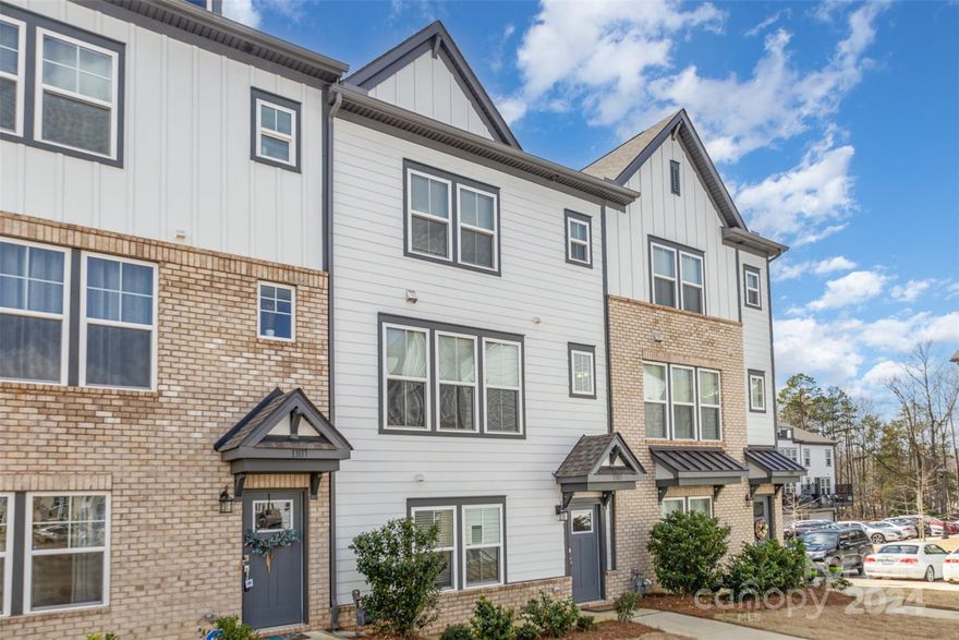 Nestled in a charming community at the Elm at Stonecrest, this townhome exudes elegance and sophistication. Step inside this "like new" townhome to discover a spacious layout, seamlessly blending contemporary design with comfort. The open-concept living area is ideal for entertaining, while the gourmet kitchen beckons culinary enthusiasts with its oversized kitchen island, stainless steel appliances, wall oven and tile backsplash. The bedrooms offer sanctuary, with luxurious ensuite bathrooms and ample closet space. As sunlight floods through the windows, the ambiance is always bright and welcoming. With a 2-car garage providing convenience and security, and a balcony offering a tranquil retreat, this townhome epitomizes modern living at its finest. Ideal location, easy access to I-485, shopping, restaurants, schools and parks.Welcome home to luxury and comfort! MOVE IN READY!