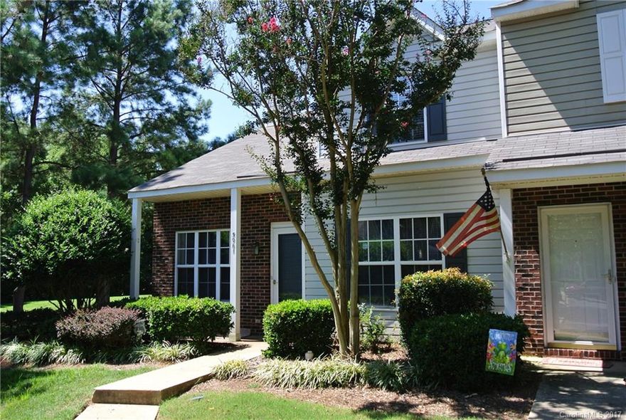 Beautiful end unit townhouse with private, fenced backyard, hardwoods on main floor, Large open kitchen with lots of cabinet space, travertine floors and black appliances. Downstairs full bath, master bedroom on main floor and an upstairs loft can be used as an office, extra sitting room or easily converted to a 3rd bedroom. Neutral paint and Carpet throughout. Washer/Dryer hookups. Central AC. Gas Heat/HW Nice community pool. Outside storage building.