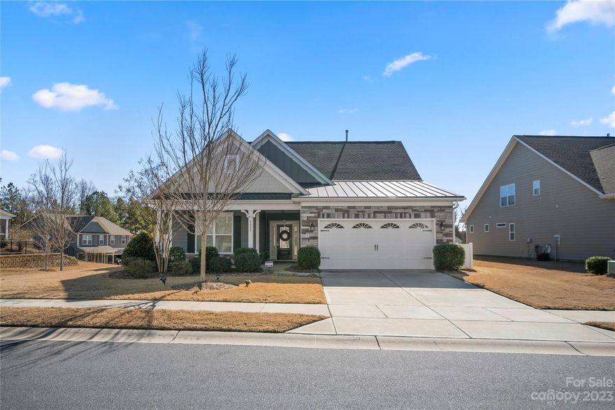 Gracious Ranch/1.5 story open floor plan!! Corner home perfectly situated in Indian Land near Ballantyne and convenient shops. The heart of this home is the gourmet kitchen, complete with a spacious island breakfast bar, perfect for entertaining guest or enjoy casual meals with family. Host family with the open kitchen, dining, or cozy up by the fireplace in living room. Enter the main bedroom with tray ceiling. Main bathroom shower is tiled throughout, walk-in closet. 2nd full bathroom and bedroom downstairs easy access for guest. Recreational room upstairs tucked away is a 3rd bedroom and full bathroom. Flex space can also be used as bedroom of storage, your choice! This homes is equipped with a modern tankless water heater, ensuring endless hot water supply while maximizing energy efficiency and saving on utility cost. Best of All! ALL LAWN CARE INCLUDED IN HOA DUES!!  THAT'S RIGHT, NO MORE MOWING!! Come see all these features and more!!