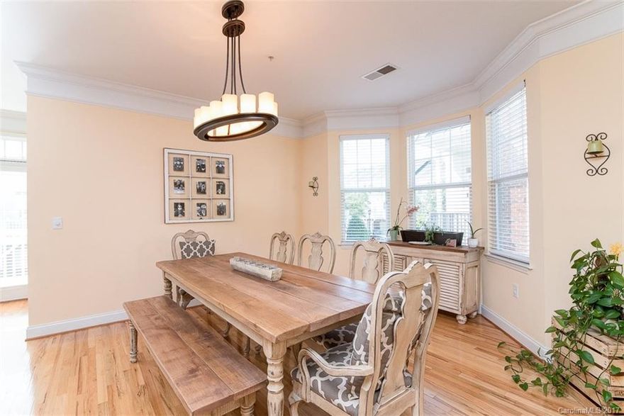 Back on Market! Buyer terminated due to financing, inspection and repairs completed. One of kind 3 Story/Basement home in Ballantyne! This 4 bed, 3.5 bath End Unit has tons of natural light and is conveniently located near shopping, restaurants and 485. Main floor has Hardwoods throughout, opens up to two separate patios perfect for entertaining and you can even see Uptown in late Fall! Basement level has a bedroom and full bathroom, great for guests. Large master up with 2 other large bedrooms.