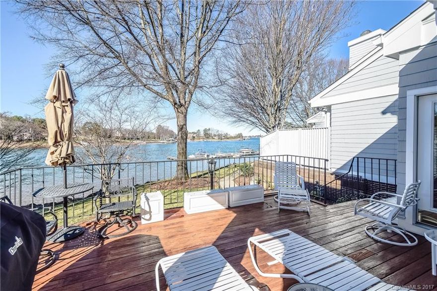 Price Reduced... Location by both land and lake is hard to beat! One of the largest town homes on the shores of Lake Norman nestled in the back of a small private Gated community in Cornelius.  End unit with tons of windows offers fantastic natural light and stunning lake views is ready its new owner! Features include: Open floor plan, 2 story ceilings, Master on the main w/ access to the deck, Walk-in closets, Pantry, Loft, Built in Sauna, over sized deck, boat slip w/ deep water on the end