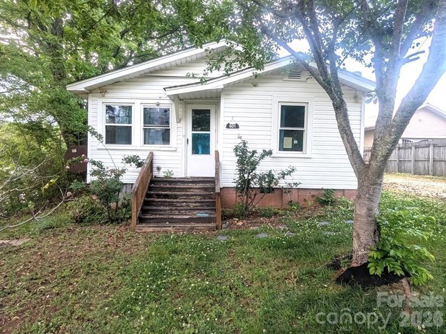 Well-located single-level home in Marion, NC offering 2 bedrooms and 1 full bathroom with a functional layout that includes a living area and eat-in kitchen. The property sits on a level lot with a yard suited for outdoor use and everyday living, conveniently positioned near schools, shopping, dining, and major access routes. An excellent opportunity for buyers seeking affordability, flexibility, and long-term value in an established area. The list price/sales price is subject to the seller’s approval. All contracts are subject to final review and approval by the seller and are not binding unless fully ratified by all parties. All offers must be submitted by the buyer’s agent via the Hubzu Auction platform.