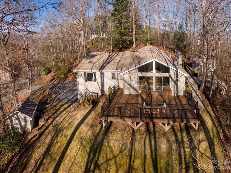 Live like you're on Vacation in this well loved & maintained home.  Step into the vaulted livingroom with large windows showing off winter Mountain and summer wooded views.   A cozy gas logged fireplace.  Hardwood floors throughout the main level.  Beautifully updated kitchen, new shaker cabinets with drawers and pull outs, stainless steel appliances, including a Dual Gas Range and a Bosch Dishwasher. Sellers have added this wonderful vaulted all year sunroom full of windows and light just off the kitchen adding to the open living feel of the home. Bathrooms have been updated with up scale style and function. Bedroom closets have custom designed closets. Downstairs has a family room with a wood burning fireplace, vinyl wood flooring, leading to a workout area and a large laundry room.  Additional storage closets added. Sellers have replaced all windows, blown in insulation, replaced the copper plumbing lines, wrapped & sealed pipes. Great home for living or for Vacation Rentals! NO HOA