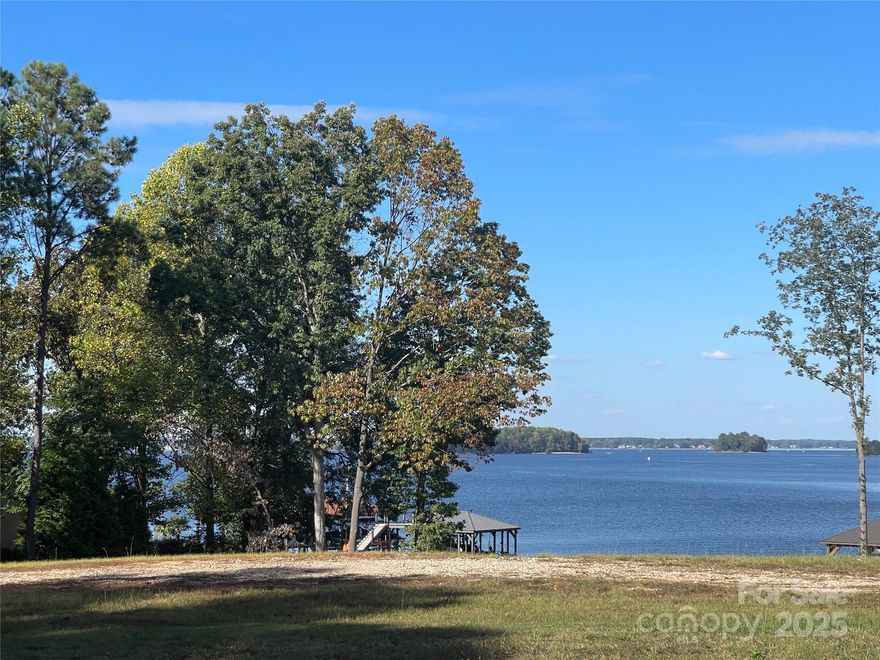 One of the last waterfront lots left on Jetton Rd! Perfect opportunity to start living the lake life with a 4 mile view from this property. Cleared and excavated for walk-out lower level with gravel semi-circle drive in place. No HOA, 1000 SF minimum building restriction, NO mobile / modular,  NO impervious and 30' setback from  shoreline! Gently sloped property ready for new dock which can be built off center to left side of shoreline.  We love buyer agents! (Survey in attachments)