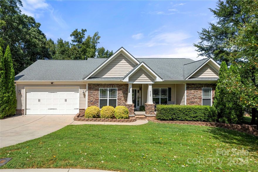 Welcome home to this spacious ranch in Belmont! This open plan is sure to please with vaulted and tray ceilings, 42' cabinets and quartz countertops in kitchen, hardwood flooring in main areas, beautiful picture frame molding in dining room, gorgeous sunroom with tons of natural light and a nice sized office/flex space. Located on a cul-de-sac with a huge, flat backyard, attached 458 sqft garage, AND a detached 610 sqft detached garage/workshop. Detached garage has access on the front and back, fully insulated, and powered with voltage for large machinery or electric vehicles. Relax on your covered rocking chair front porch, expansive back deck, or float in your above-ground pool with newer liner and pump.  Attic has ample space as well as shed. Backyard is beautifully landscaped, fenced and private, perfect for entertaining. This home is gorgeous and located in the desirable Abbington subdivision in Belmont. Convenient to dining, shopping, major highways, I85 and mins to CLT airport.