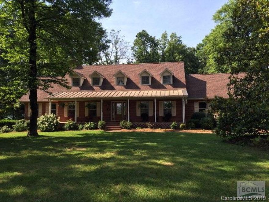 A RARE FIND: All brick 2 Story home w/bsmt on 16.9 acres. Additional land available. Property has fenced pasture, riding ring, nice barn w/stalls, two storage buildings. In-ground pool area with pool house featuring a tiki bar and half bath. House has HW floors, neutral colors and updated kitchen w/granite counters and new cabinets. Two way stone gas FP in to kitchen and large great room w/vaulted, beamed ceilings. Great room in basement is heated and finished w/brick FP but there the finished area is not permitted and not reflected in the tax value. Well available for irrigation/livestock. Beautiful paved entry and landscaping. All the land is level and usable. Convenient to Hickory, Newton, and Charlotte right off Hwy 16. Perfect for horses or just a secluded estate.
