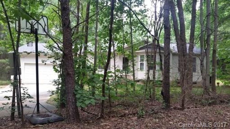 3 bedroom home located in Mills Forest. Ranch style home features a bay window in the living room. Galley style kitchen. 2 car garage and storage building. Large deck for entertaining. Large bonus room/extra living room in back of home.