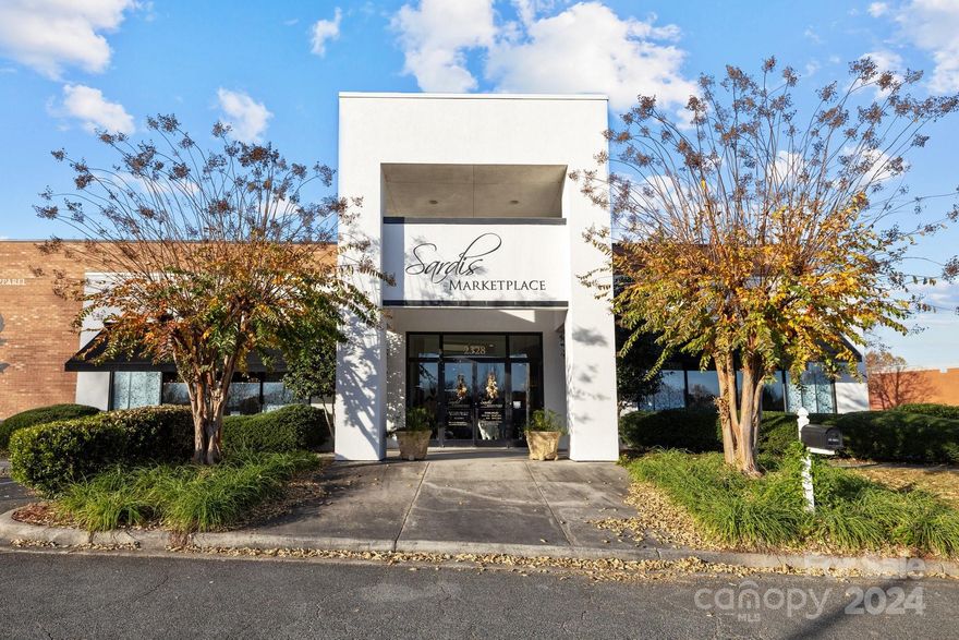 Exciting light industrial/storage/showroom opportunity on a prime corner lot near Matthews (28227 zip code). This massive 20,707 SF property on a 2.34 acre lot is designed for success with 82 parking spaces, a newer roof, and HVAC systems installed within the last 5 years. The electrical system is versatile, accommodating any use and load. Revel in the expansive 16' plus ceiling heights and abundant natural light. Streamline operations with a great loading dock. Positioned in the path of progress, the upcoming LYNX Silver Line light rail enhances the property's value. Act now to secure a dynamic space, blending style, functionality, and strategic accessibility for your retail or showroom venture!