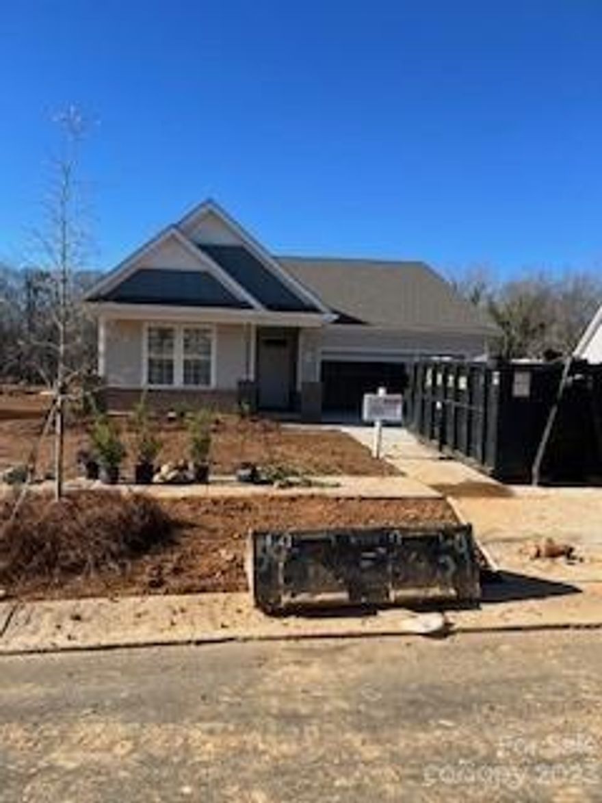 Welcome to Medlin Forest!! BRAND NEW Community in the beautiful town of Monroe. This sizeable home offers 3 bedrooms and 2 full baths, with the Primary Bedroom on the 1st floor! The Belair also offers an open floor plan with 9 ft ceilings. The kitchen features an oversized eat-at island with plenty of cabinet and countertop space, including a huge walk-in pantry! This home is perfect for entertaining or gathering as a family. Enjoy your covered front and rear porches. Convenient to downtown Monroe with easy access to amenities! This home offers all the benefits of new construction.