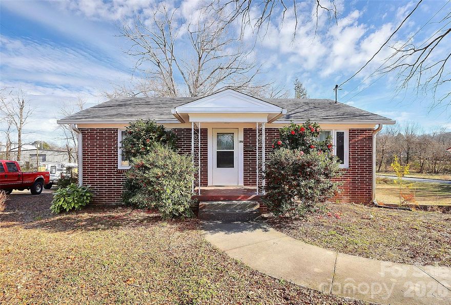 This single-story, brick home features 3 bedrooms and 2 bathrooms, a formal living room, and an open-concept kitchen, dining, and living area.
which has been recently partially remodeled with fresh paint, new laminate flooring, Granite countertops, new kitchen cabinets, new windows, and new doors. Ready to move in.
It also has a full, unfinished basement with a garage door and exterior access. One room and the workshop in the basement are heated and air-conditioned. 
Located just minutes from the heart of Shelby, you’re close to local shops and dining.