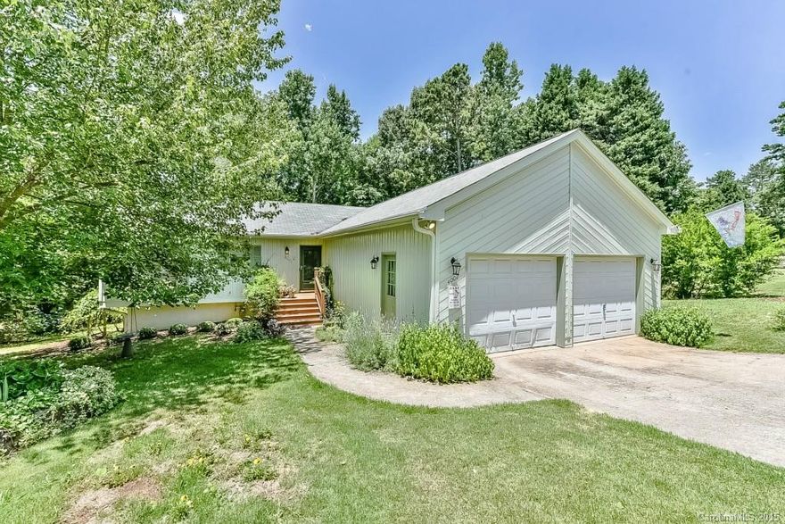 Beautiful setting & Welcoming Space w/perennials & trees to welcome you home & enjoy from the sun room & lower screen porch. You'll love living here. Great flex space on main w/great room open to formal dining/office & bright sunroom, large master suite w/large tile shower and French doors to sunroom.  Granite kitchen w/breakfast room. Lower level has a huge recreation room w/French doors to the porch & two additional bedrooms plus a sitting room.  All have access to the screen porch.