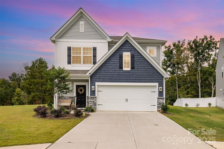 Welcome to this pristine 1-year-old home in the highly sought-after Walnut Creek neighborhood of Indian Land, SC! Perfectly positioned on a quiet cul-de-sac, this property sits on one of the largest lots in the community and offers rare privacy with a WOODED backdrop. With 4 spacious bedrooms, an open layout, and modern upgrades throughout, this move-in ready home checks every box for today’s buyer.
Step inside to find gorgeous laminate wood floors that flow throughout the main level and staircase, setting a warm and inviting tone. The bright, open-concept design features a stunning kitchen with stainless steel appliances, a large island, and plenty of cabinet and counter space—ideal for both everyday living and entertaining. The main-level primary suite provides comfort and convenience with a spa-like en suite bath and generous walk-in closet. Upstairs, a large loft offers flexible space perfect for a home office, playroom, or media area, along with three additional bedrooms and full bath.
This home has been barely lived in and feels brand new. Every detail is clean, fresh, and ready for its next owner to simply move in and start enjoying. The oversized backyard is a standout feature — usable and backing to trees for a natural and private setting. Whether you’re grilling out, gardening, or just relaxing, this outdoor space is a true extension of the home.
Living in Walnut Creek means more than just owning a beautiful house — you’ll enjoy resort-style amenities and a vibrant community lifestyle. Residents have access to 2 pools, walking trails, and County sports fields, picnic area, tennis and pickleball courts and small lake. Walnut Creek is also ideally located near Ballantyne, Fort Mill, and Charlotte, with easy access to shopping, dining, top-rated schools, and major highways for commuting. Property taxes include a land bond for development of Walnut Creek.