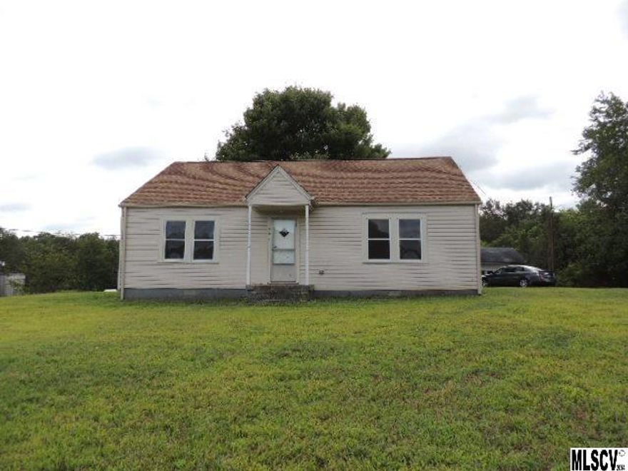 Nicely updated, 2 Bdrm, 1 Bath home featuring new tile and laminate floors, new kitchen cabinets, and new appliances to be installed. All major systems have been replaced including roof, windows, HVAC, water heater, and bath fixtures. Electrical and plumbing has been upgraded. There is a huge garage/workshop behind house, as well as a large woodshed. There is also a laundry/mudroom on the back of the house.