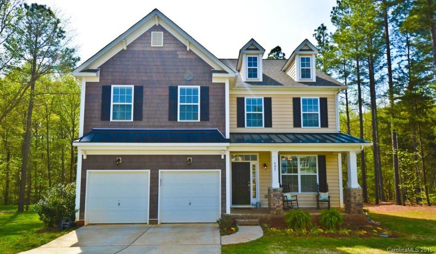 Beautiful private wooded cul-de-sac home with 4BR/3.5BA. This open concept has a large kitchen that would impress any cook! Counter space galore!  The sizable family room and breakfast nook are perfect for entertaining. Master suite w/ trey & master bath with separate tub & shower.  Deck overlooks expansive grassed yard that backs up to trees! Newly painted.  This home is a must see!