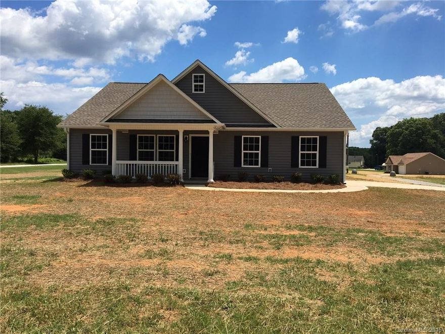 Beautiful new ranch home on almost 1 acre of land! Stainless appliances, vaulted family room, hardwood floors, granite counter tops, outside patio, and more!