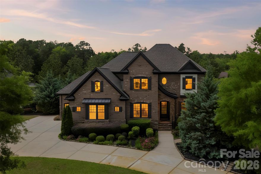 Welcome to this stunning full brick home in the gated community of Quintessa, thoughtfully designed for both comfortable everyday living and effortless entertaining. The very private fully landscaped and fenced in backyard is a standout feature with an in-ground saltwater pool, tanning ledge, spacious patio, and covered porch — creating the perfect setting to relax or host.
Inside, the main level features 10-foot ceilings, 8-foot doors, fully refurbished hardwood floors, and plantation shutters throughout. The gourmet kitchen is the heart of the home, complete with double ovens, a 5-burner gas cooktop, granite countertops, a large island with seating, and a walk-in pantry with custom wood shelving. The family room offers a coffered ceiling and gas log fireplace, while additional main-level spaces include a formal dining room, with a butler’s pantry, dramatic two-story foyer, drop zone, half bath, large utility closet, and a private office with French doors that can also function as a guest bedroom or flex space.
The spacious primary suite features a tray ceiling and a spa like en-suite bath with a garden tub, dual vanities, and an oversized L-shaped walk-in closet with direct access to the laundry room. Upstairs, you’ll find 3 additional bedrooms with walk-in closets, two full bathrooms, and an oversized media room with plenty of closet space, which can also be used as a playroom, or additional bedroom .
Highlights include a 3-car garage with an EV charger, a circular drive which provides ample parking, and an irrigation system. Recent updates include:
• New landscaping (2026)
• Interior repainted (2026)
• Salt cell pool system (2025)
• Preventative termite bond (2025)
• Epoxy garage flooring (2022)
• 60-volt EV charger (2021)