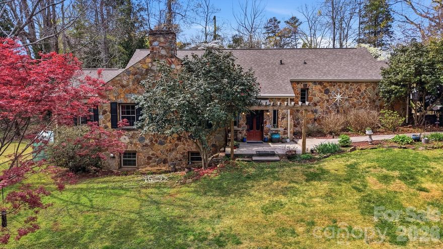 $10,000 price REDUCTION on this  charming full of character this iconic 1930s all-stone home in Bessemer City, perfectly situated on over an acre of private land just minutes from downtown. Filled with timeless appeal and thoughtful updates, this unique home welcomes you with a warm foyer that flows into a cozy living room anchored by a striking stone fireplace. The kitchen features updated countertops, a stylish backsplash, and a comfortable eat-in area,and even a walk in pantry,ideal for everyday living. A bright sunroom just off the main living space offers the perfect spot for a home office, reading nook, or creative retreat.
Upstairs, the expanded and recently updated primary bedroom provides a relaxing escape, while a huge bonus room spanning nearly half the length of the home offers endless possibilities for recreation, media, hobbies, or additional storage. Step outside to your private patio—an inviting place to unwind or entertain while enjoying the peaceful surroundings.
Major improvements have already been completed, including newer windows (2021), HVAC system with three energy-efficient mini splits (2021), updated electrical (2021), new plumbing (2022), a new 8x12 outdoor shed.(2025), and a fenced backyard (2025). Roof 2020 per prior owner With the big-ticket updates already done, all that’s left is to move in and enjoy this one-of-a-kind home where historic charm meets modern convenience.