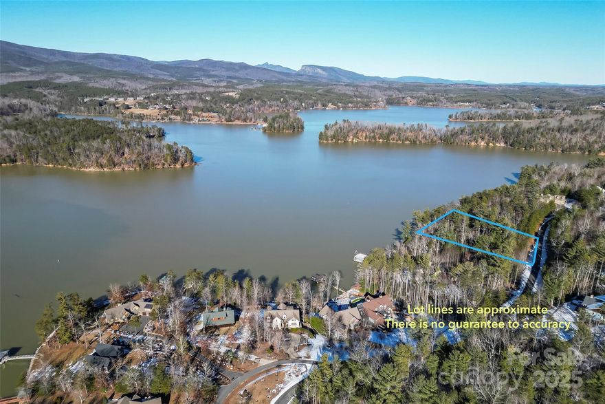 Waterfront lot offering long range mountain and beautiful Lake James views. The Arbor at Lake James is a gated waterfront community with paved roads, underground utilities, community walking trails, picnic pavilion and gated boat storage area.  Well and septic are needed but lot has been approved for a 4Bedroom septic.  Build your full time or vacation home and look out over Lake James to the beautiful Blue Ridge Mountains.  Short term rentals allow for an investment or income supplement.  Private dock can be built with approved permit from Duke.  Just 10 minutes to downtown Marion, shops, restaurants and services.