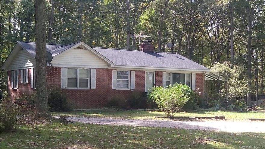 Make this house your home! The perfect country setting! This home features a nice eat-in kitchen, walk-in closets and a recently refreshed sunroom; which makes for a convenient, cozy retreat. 4BR/2.5BA brick ranch...Spacious yard...Wired Workshop and outdoor cellar. This home has so much to offer!