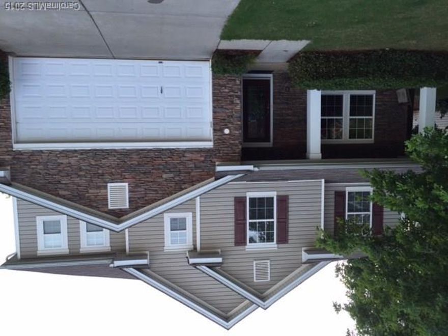 Soaring ceilings, neutral décor with some accent color, beautiful verticle laminate floors on first floor. Quiet, peaceful setting in back yard....no neighbors, just wonderful trees extending to the golf course. Great Commuting to I-77 and Fort Mill Springfield Parkway. 10 Minutes to Carolina Place Mall, 10 minutes to Carrowinds and Cabela's. Local dining close by.