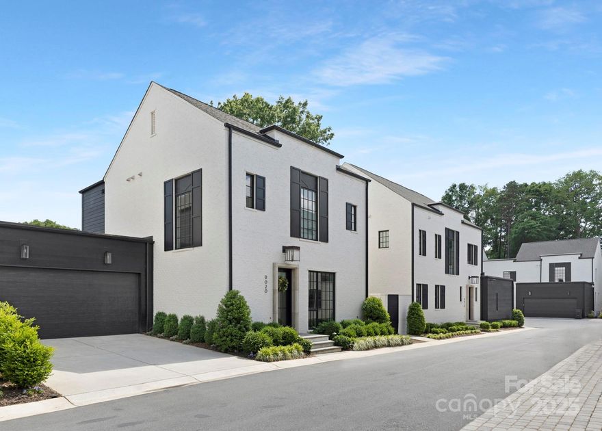 Must see luxury living in an unbeatable location, just minutes away from shopping and dining at Strawberry Hill and SouthPark mall. Built in 2021, this townhome was designed with meticulous attention to detail and constructed with exquisite craftsmanship. Functional floor plan lives like a single family home with 10 ft ceilings & large windows that bring in tons of natural light. Open concept living area on the main with gas fireplace in living and designer plumbing/lighting finishes throughout. Primary suite plus an office on the main floor. Home offers custom cabinets & mouldings, white oak engineered hardwood floors and beautiful brick exterior. Cook and entertain in the high end kitchen with quartz island, Thermador appliances and custom range hood. Dining room includes beverage refrigerator with built-in shelving, cabinets & bench seating. Primary bathroom features dual vanities & a luxurious shower. All secondary bedrooms feature ensuite bathrooms and sizable walk-in closets.