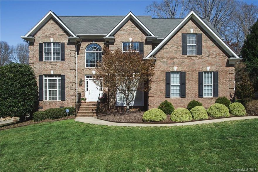 If only all homes could be as well maintained as this one! Bright, open plan is great for gathering & entertaining. HUGE kitchen opens to breakfast & family rm.  Serene sunporch overlooks, private, flat acre! Formals are beautiful w/ grand moldings & hardwood floors thru-out main. Private study on 1st floor. Grand Owners suite w/ trey ceiling, impressive master bath & HUGE walk-in closet! All secondary beds have private access to baths. Don't miss walk-up attic Storage! Sought after location!