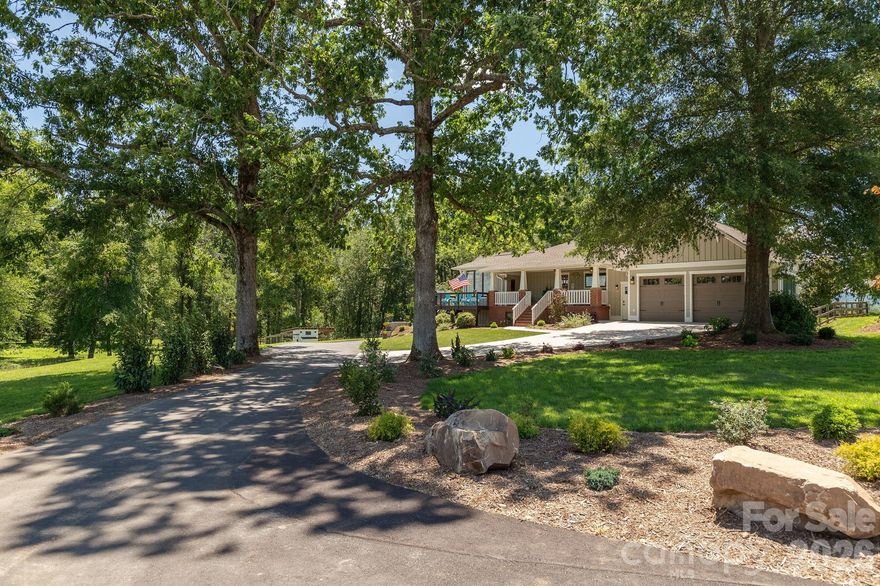 Centrally located between Asheville, Hendersonville, and Brevard, don't miss this RARE opportunity to own over 2 acres of unrestricted land inside the town limits of Mills River (available with or without the animals!). Large yard, mountain views, and over 4000 sqft of fully remodeled and expanded home (2018-19). Primary BR, office, 3 additional bedrooms, and garage ALL on the main level. Oversized attached 2 car garage, 3 bay detached shop. 4 zone HVAC, tankless water heater, natural gas generator, large covered porch, and open deck. Inside, you will find open and bright like you will rarely see, cathedral ceilings in living and primary, and custom finishes throughout. The basement offers a rec room, an exercise room, and a half bath; and it also has over 1400 sqft of unfinished space for storage. Too much to list here.  MORE ACREAGE OFFERED UNDER MLS# 4273604.
SHOWN BY APPTOINTMENT ONLY.  HOME AND SHOP ARE NOT LOCATED IN ANY FLOOD ZONE or PLAIN.