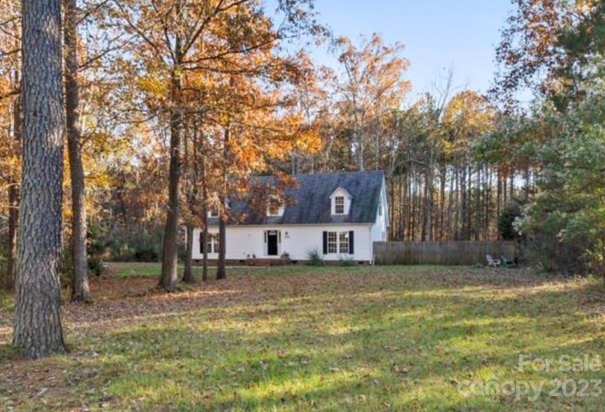 Enjoy privacy and quiet living in a wonderful community on 1.6 acres surrounded by mature trees. Primary bedroom and a second bedroom are located on main floor. Upstairs features two large bedrooms, and a spacious loft that could be used as a playroom or office. This Home offers an abundance of space and has tons of potential.  A remodel was started but not completed. The kitchen was removed and is a blank slate for you to update and make your own. Several sections of subflooring need repair.  Desirable Clover schools. Located just minutes from Lake Wylie. County taxes. Property is being sold “as is”. Seller will not make any repairs.