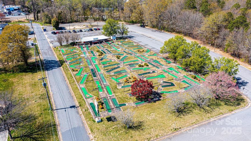 This is a fantastic opportunity to acquire a parcel of prime land in Hickory, located right off Highway 70.  The property features updated putting greens and fresh paint, ensuring the business is ready for operation. A new camera system has been installed for added security, and the large parking area provides ample space for visitors. With its high-traffic location and potential for future growth, this property offers both a solid business venture and a prime piece of real estate. Whether you’re looking to continue the Putt Putt course or explore other development options, this property provides endless possibilities.