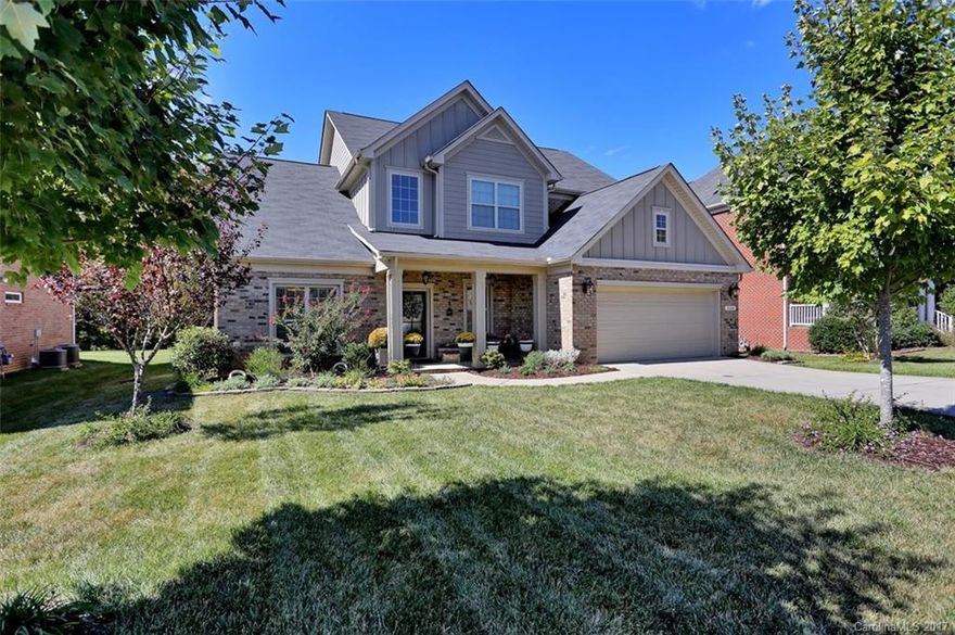 Designer updates galore in this beautiful Barrington home!  The home is in near perfect condition with fresh paint and tons of natural lighting.  First floor includes two-story foyer, open living areas and Master Retreat.  Second floor has three bedrooms, two full baths and large bonus/ playroom.  Wooded lot backs to the community walking trail.  This home features lots of storage in the kitchen as well as multiple attic areas.