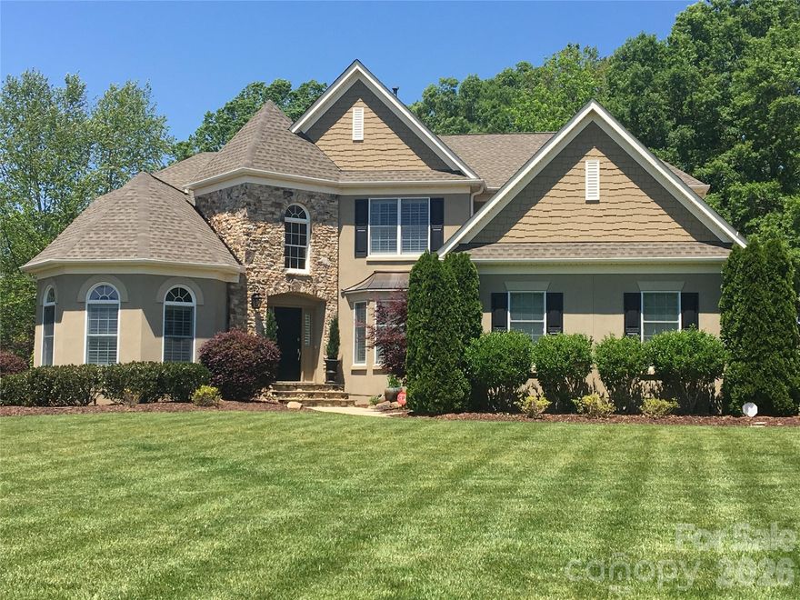 One of the best locations in Marvin Creek! Enjoy the peace and quiet of a private cul-de-sac lot within walking distance to elementary school & bus stop. This beautifully updated home features a whole house Generac generator powered by natural gas, site finished hardwoods on main, new carpet & paint throughout, and a fully finished walk-out basement on a .74 acre lot. 2 story family room is open to an updated kitchen which features stainless steel appliances, double wall oven, quartz counter tops, light cabinets and large walk in pantry. Enjoy seamless indoor/outdoor living in the custom 3 season porch featuring a wood burning fireplace w/gas fired log starter, & Eze Breeze windows. Primary bedroom located on main level features a fully renovated bathroom with spacious shower, freestanding soaking tub, separate vanites and walk-in closet w/built in shelving. Either of the two staircases lead to the upstairs where you will find a large bonus room & 3 secondary bedrooms, one with ensuite bathroom and 2 sharing a Jack/Jill bathroom. The basement has a what can be a large bedroom with ensuite bathroom or office, bar area for entertaining and open area for media or play, great for guests. Conveniently located to schools, shopping, entertainment and restaurants in Blakeney & Waverly, this one is not to be missed! Basement bedroom does not have egress.