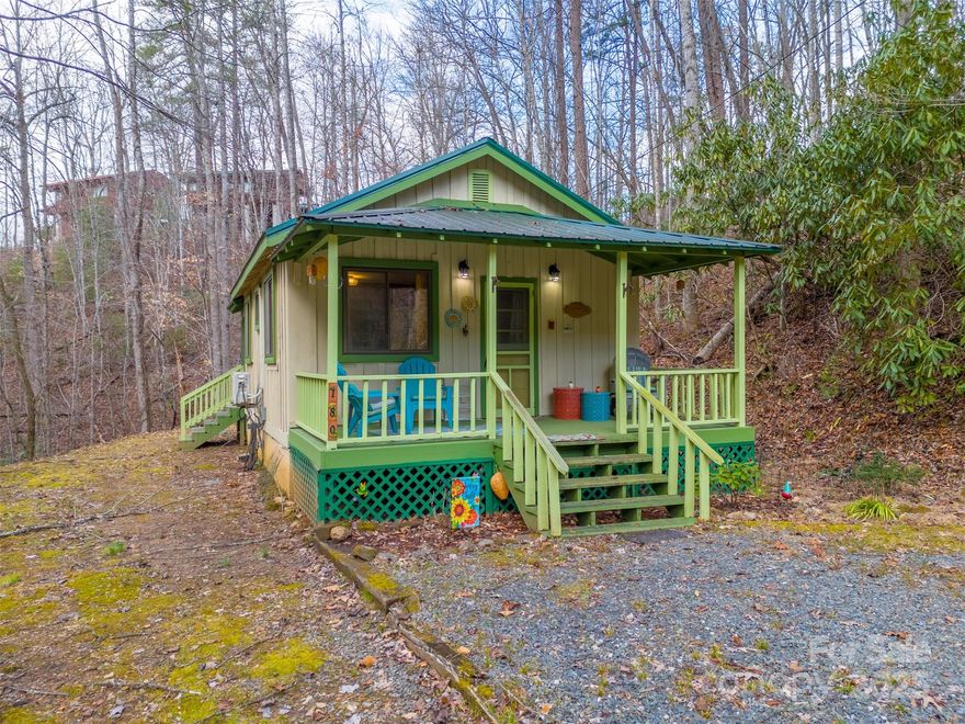 Charming and secluded feeling, yet close to all the attractions in and around Bryson City! This historic 1-bedroom, 1-bath cabin offers a peaceful pond view from the front porch, or you can relax on the screened back porch, surrounded by the beauty of nature. For adventure lovers, the cabin is less than four miles from the Nantahala Outdoor Center, offering whitewater rafting, kayaking, hiking trails, dining, and shopping. Fontana Lake is within hiking distance! Plus, you're just 10 miles from the Great Smoky Mountain Railroad and about 25 minutes from Harrah's Cherokee Casino. This turn-key cabin includes beautiful linens for easy turnovers, a DVD player, and a large collection of DVDs, making it an excellent short-term rental or a cozy weekend retreat. It's being sold fully furnished—ready to enjoy or rent out immediately!