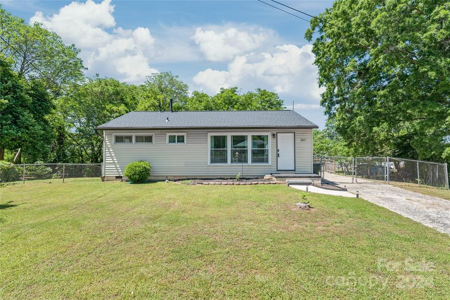 Updates include New Neutral Paint, new windows in living room, furnace and hvac 2 years old, updated Bathroom with new toilet/plumbing/lighting/vanity and new ceiling fans, New Roof and warranty to be transferred, new dishwasher (never used).  This cute affordable 3 bdrm house has been updated.  The kitchen has a new stackable Washer/Dryer and New Refrigerator, owner paid $5,600 for new appliances to be conveyed to new owner. Cute living area with great views of front culdesac with largest Bdrm, off kitch and central hallway.  Home being sold 'as is' with recent updates.  A surprise basement level that is great for the hobby person who wants to have a workshop, storage or a place for extended use if you decide to convert it.  The wide fenced in back yard area is great for a play area or your pets.  The owner is transferring and looking for a quick sale and has updated most of the home.