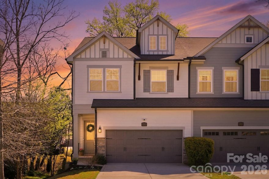 Beautifully designed 2,429 sq ft luxury duet in Villa Heights featuring 10’ ceilings, curated finishes, and exceptional storage rarely found in duet living. The open-concept main level showcases a gas fireplace, built-in drop zone, and a thoughtfully upgraded kitchen with gas cooktop, beverage cooler, dedicated pantry, and additional upper cabinetry.

Custom details including board and batten molding, beadboard accents, and designer lighting elevate the home throughout. The dining space features a striking accent wall, creating a true focal point for entertaining.

Upstairs, the spacious primary suite offers a tray ceiling, custom walk-in closet system, and a well-appointed bath with oversized soaking tub and private water closet.

Enjoy the covered rear deck overlooking trees and a peaceful stream, along with a gas line stub for future outdoor grilling. A standout feature is the tall, walkable crawl space with vapor barrier, providing exceptional storage not typically found in townhomes.

Located just minutes from NoDa, Plaza Midwood, and Uptown.