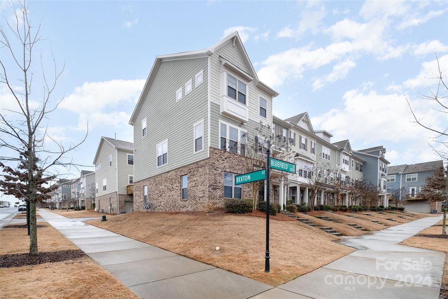 Situated within the prestigious Hadley at Arrowood Station community, this exceptional 3-story, 2,100 SF townhouse seamlessly blends luxury with 3 BRs, 3.5 baths, and 2-car garage. The open-concept kitchen exudes sophistication, featuring a spacious island, 42" cabinets, granite countertops, and SS appliances, including a gas range with a double oven. Flowing seamlessly into the dining and living room, this space creates an ideal environment for social gatherings. The primary suite, a true haven, showcases a tray ceiling, an elegant entertainment center, an ample walk-in closet, and a deluxe bath with a sizable shower. Outdoor entertaining is effortlessly facilitated on the deck directly accessible from the kitchen. This community offers a complete lifestyle with amenities such as a pool, cabanas, gas grills, and plenty of shade. Positioned just minutes away from the light rail station, shopping centers, airport, and Uptown, this townhouse presents both luxury and convenience.