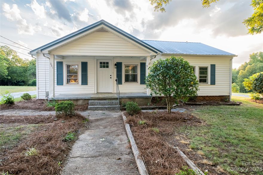 Beautifully remodeled home just outside the heart of Albemarle. 3BD/2BA open floorplan with luxury vinyl floors throughout the main living area and brand new carpet in the bedrooms. New kitchen features, new stainless steel appliances, granite countertops and updated cabinets with large stainless steel farmhouse sink. Completely updated bathrooms including new showers, toilets, vanities and flooring. Separate laundry room with new gas water heater.
Large, flat lot with plenty of room for the kiddos, animals or for garden. Gravel driveway circles the home and large detached garage with 2 car lean-to attached is perfect for the mancave, sheshed, workshop or just extra storage. Don't miss your opportunity to own this beautiful home mins from Badin Lake, Lake Tillery, Morrow Mountain and only an hour from Charlotte!! 

DISCLAIMER: SELLERS ARE LICENSED NC REAL ESTATE AGENTS.