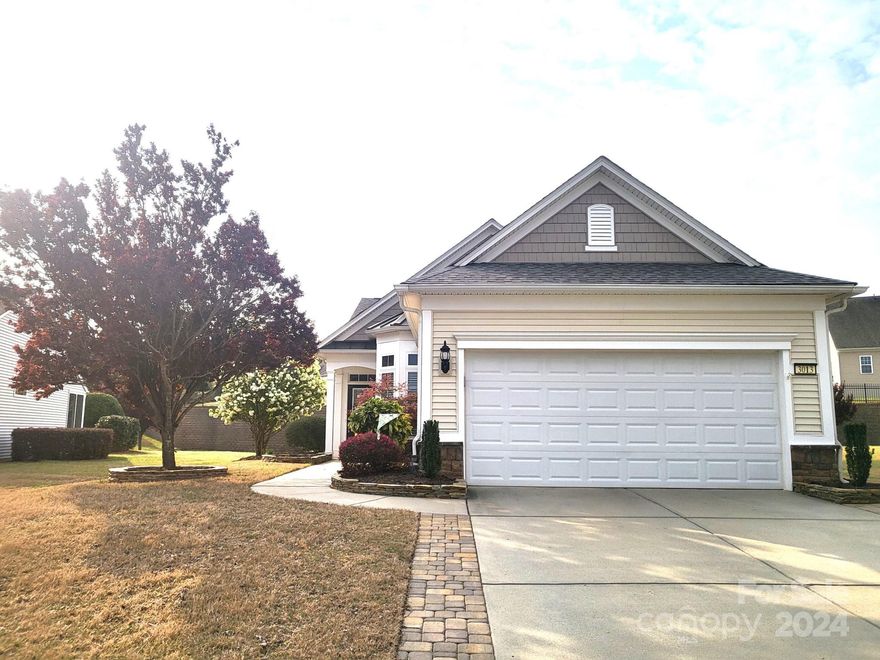 55+ Community - Beautifully Remodeled from Top to Bottom Home: New Roof (2022); New HVAC & Water Heater (2021); Remodeled Kitchen solid wood cabinets with beautifully tiled backsplash; quartz countertops; all new appliances, gas stove, counter-depth refrigerator, dishwasher, washer & dryer and microwave. All pull-out drawers in cabinets (kitchen & baths) soft close in kitchen. Wainscoting in foyer & dining room. Crown Molding throughout (even bathrooms). All newly painted in 2021. Double sliders to large screened-in porch. Master Bath & 2nd bath showers remodeled & upgraded counters & lighting throughout home. All new fans; smoke detectors; garage door opener; keypad to garage; phantom screen for front door; 3/4 glass insert in front door; all luxury vinyl plank flooring with cork backing throughout entire house. Driveway paver extended on both sides; patio extended with pavers also. All new stone-work in front beds & tree.