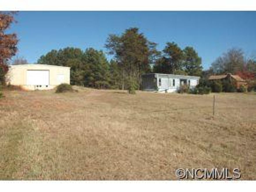 Foreclosure Bank Owned. Located on busy Hwy 11 in SC. Three parcels totaling 5.86 acres. Three buildings located on property Residence approximately 1380 sq. ft, Office Trailer approximately 671 sq. ft, and Warehouse approximately 5200 sq. ft.  Vacant. Contact for showing details. Buyers Representative to verify all details.