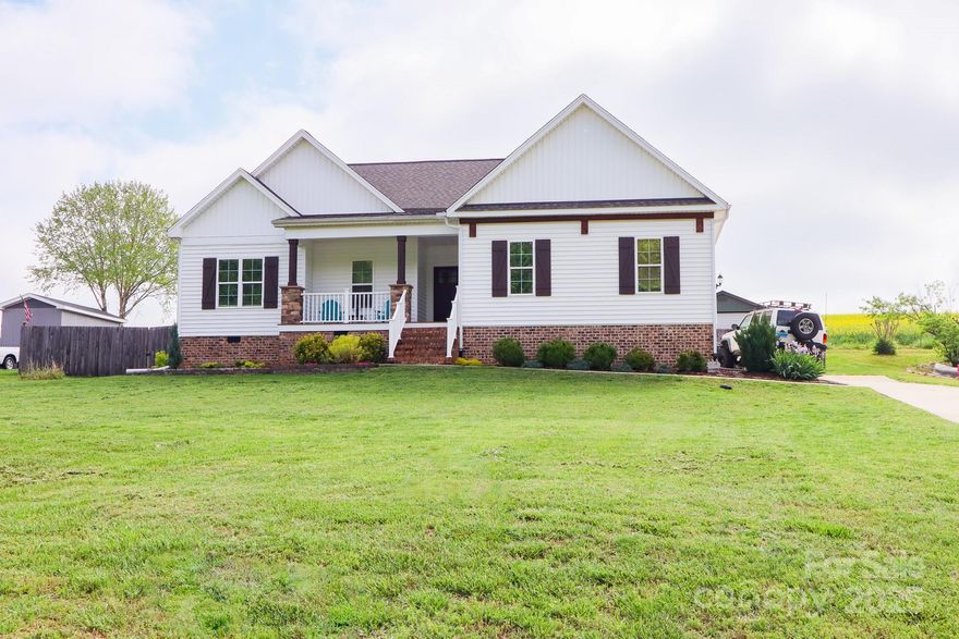 New price. Inviting 3 bedroom, 2 bath residence with an open floor plan and attached 2-car garage. Kitchen, dining, and living areas connect for easy daily living and entertaining. The primary suite features a large shower and separate soaking tub. Outdoor living includes a 15' x 13' covered front porch and a 14' x 9' covered back patio. Convenient Statesville location close to shopping and dining.