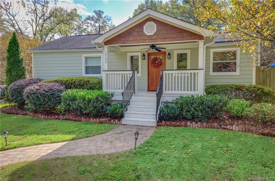 This completely renovated bungalow has a great lot! Beautiful kitchen has solid surface countertop, tile backsplash, wine rack and double door pantry. Large master suite has a door leading to screen porch and a large walk-in-closet. Master bath features dual vanities, separate tub and shower. Large living room and dining room has a fireplace. Wood floors throughout except for 2 bedrooms and tile in kitchen and baths. Wired storage shed. Enjoy views of the private backyard from your screen porch!