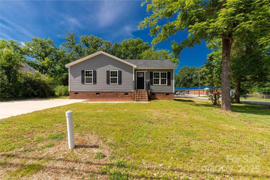Welcome to your dream home! This exquisite 3-bedroom, 2-bathroom property is a masterpiece of affordable modern living, perfectly situated on a desirable corner lot in the vibrant community of Rock Hill, South Carolina. With its sleek design and thoughtful layout, this new construction home is ready for you to create lasting memories. Step inside to discover an inviting open-concept living space that seamlessly connects the living room and kitchen. Don’t miss the opportunity to make this stunning new construction home your own! With its perfect blend of style, comfort, and convenience, this property is ideal for families, first-time homebuyers, or anyone looking to enjoy the best of Rock Hill living. Schedule your private tour today and step into your future!