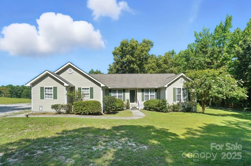 Charming 3-bedroom, 2-bathroom home nestled on a spacious 1-acre lot! This property features a 2-car garage, versatile flex space perfect for an office or playroom, and a large back deck ideal for entertaining or relaxing. Enjoy the peace and privacy of country living with plenty of room to spread out—inside and out!